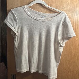 A cream brandy Melville t-shirt